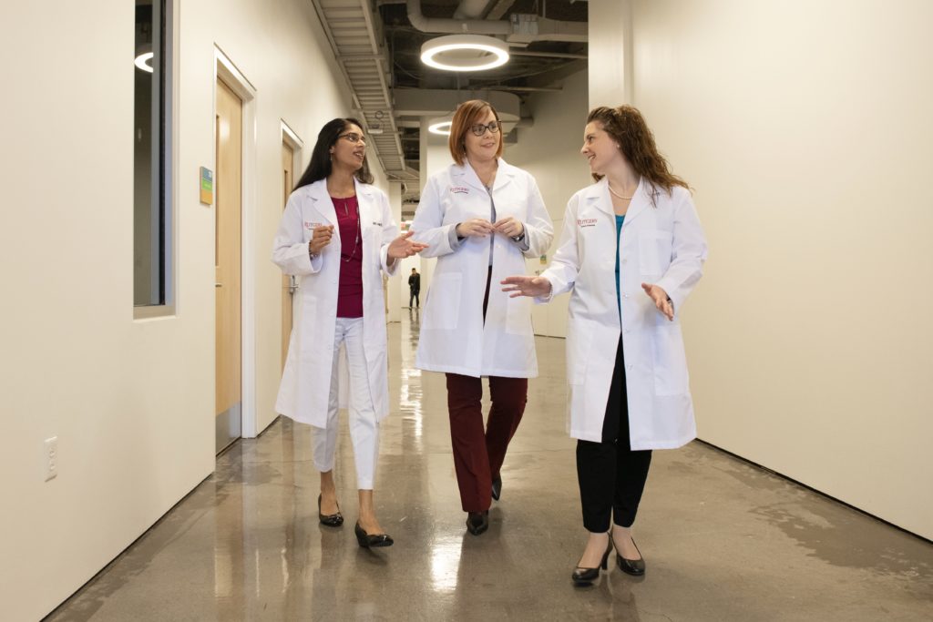 Rutgers Nursing PhD students in white coats