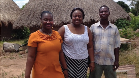 Iwu (center) with health care colleagues at a primary care center in rural Benue State.