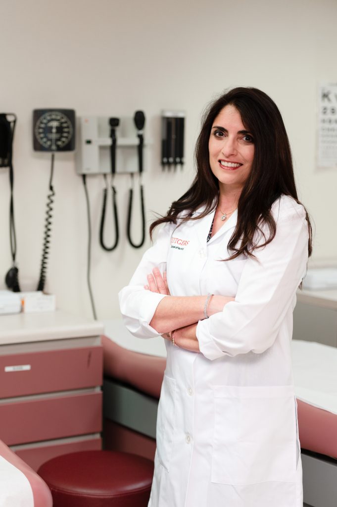 Margaret  Quinn in a lab coat
