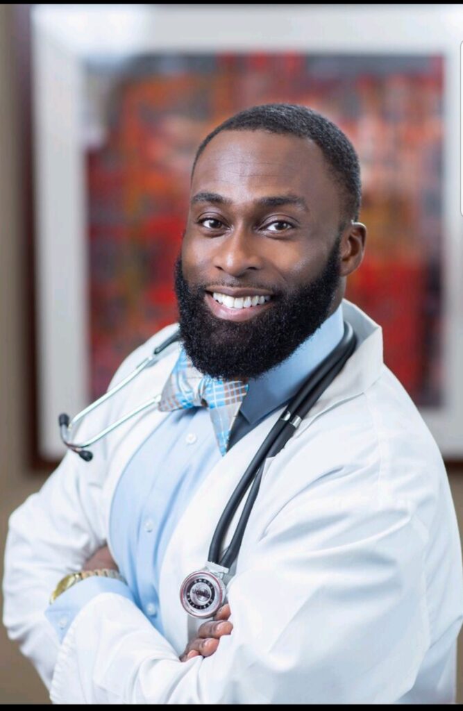 Kenneth Gyan in a white coat