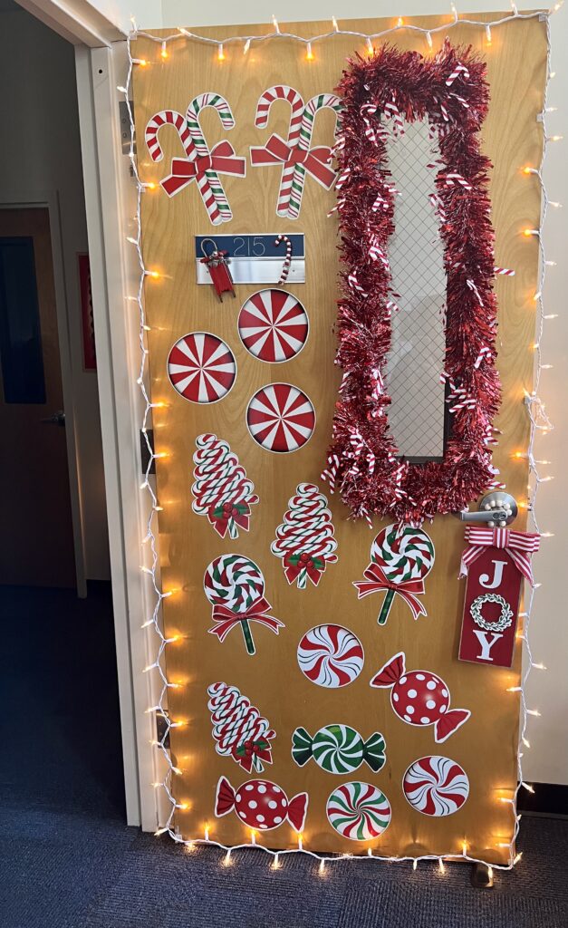 Sweeney Door decoration - Gold paper with cutouts and holiday lights