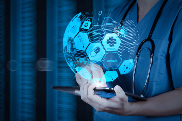 Nurse with Tablet and holographic Globe (Conceptual photo)
